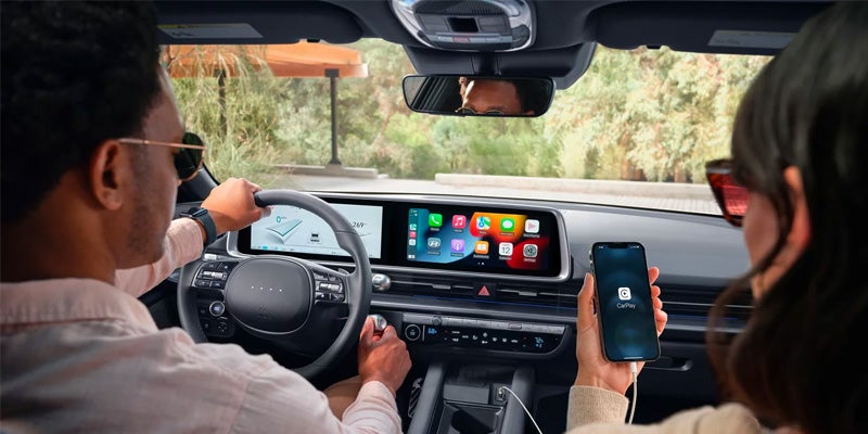 man driving Hyundai Ioniq 6